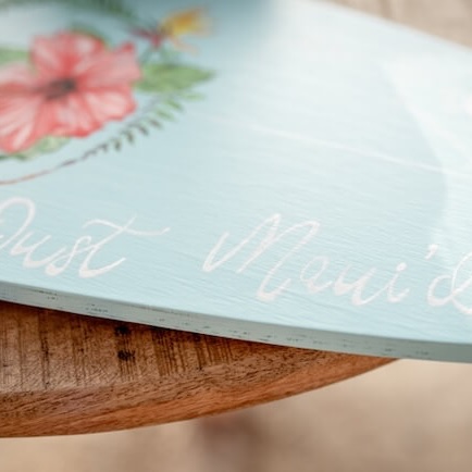 Houten bord met bloemen en tekst
